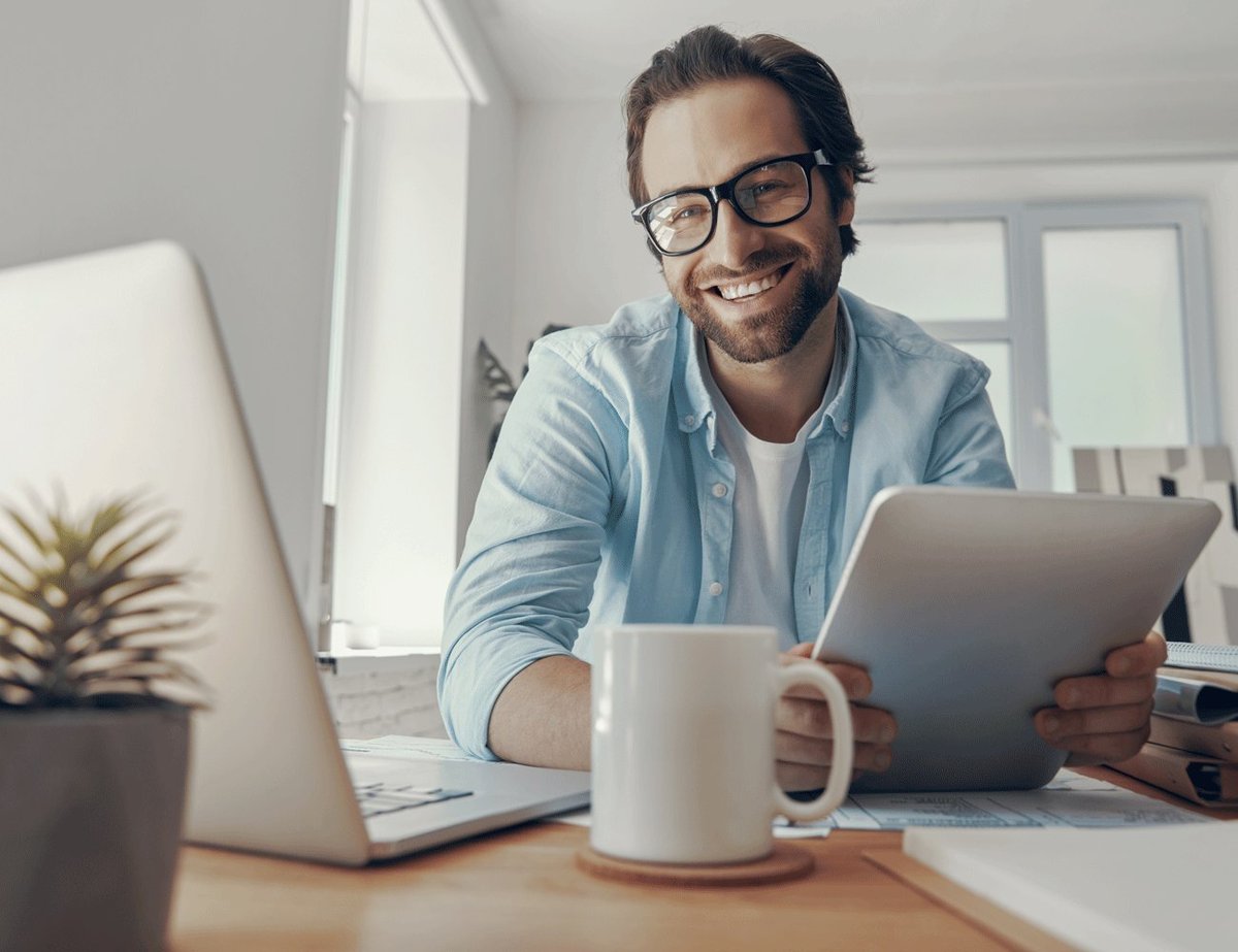 Home-based travel advisor planning a trip on a tablet